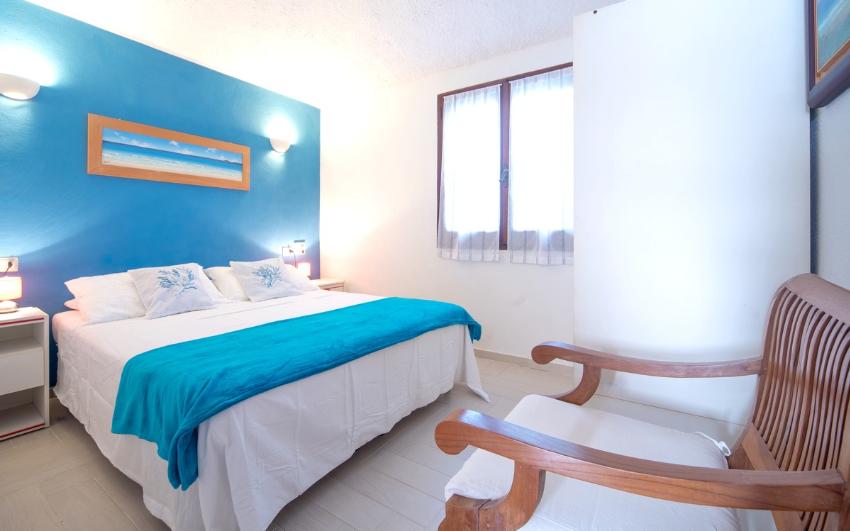 camera da letto casa costa rei